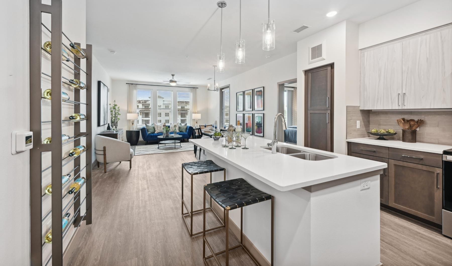 a kitchen with white cabinets